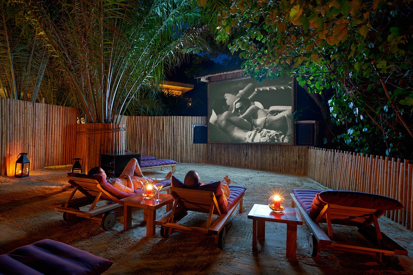 Watching movies outdoors in Jungle Cinema at Six Senses Con Dao