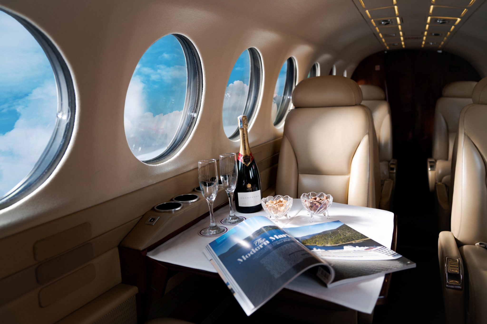 wine inside of private jet to six senses con dao